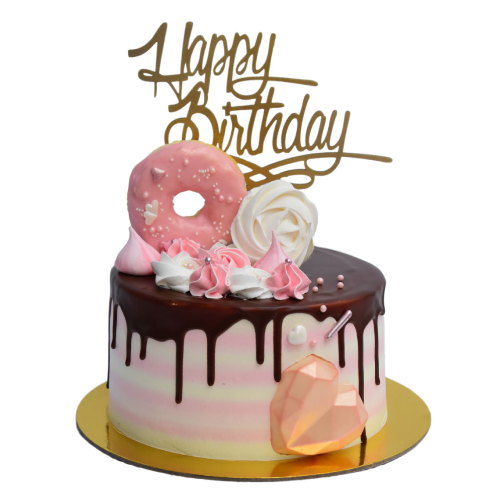 Torta con donas y letrero de happy birthday