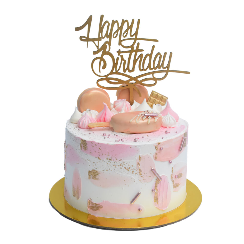 Torta rosa con letrero de Happy BIrthday